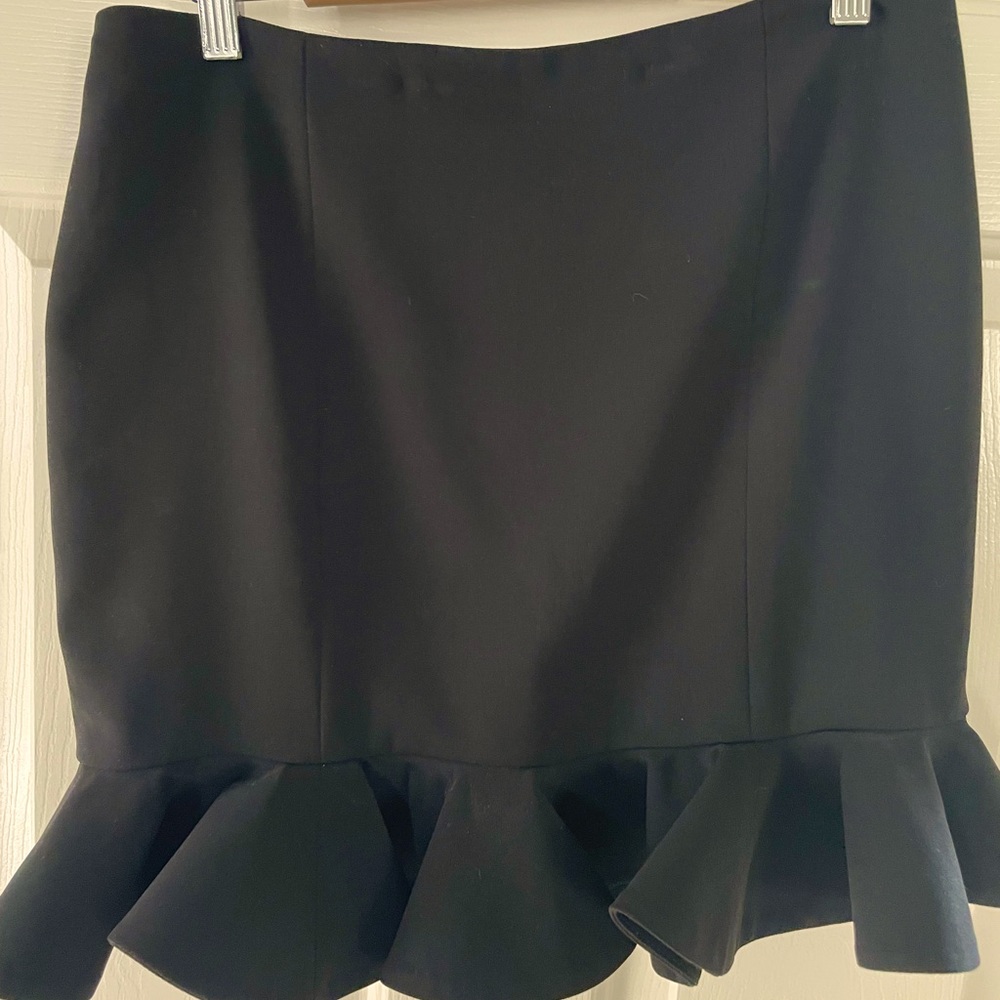 Brand new mini skirt with frills
